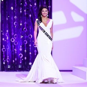 JOVANI GOWN,WORN 1x Size 0-dress has 2 small stains